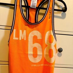 Reebok Les Mills Orange Jersey Top. Sz XS